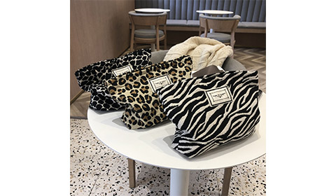 black and white leopard print toiletry  bag